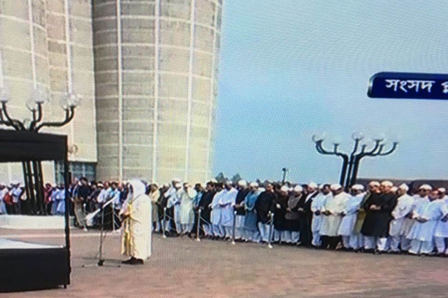 A screen grab taken from television shows people join the second namaz-e-janaza of former mayor and BNP vice-chairman Sadeque Hossain Khoka at the South Plaza of National Parliament in Dhaka on Thursday