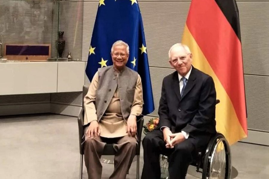President of the Bundestag, Wolfgang Shauble discussing key economic issues with Nobel Laureate Professor Muhammed Yunus at the former's office in Berlin on Wednesday local time. Nasir Ali Mamun/Yunus Centre.
