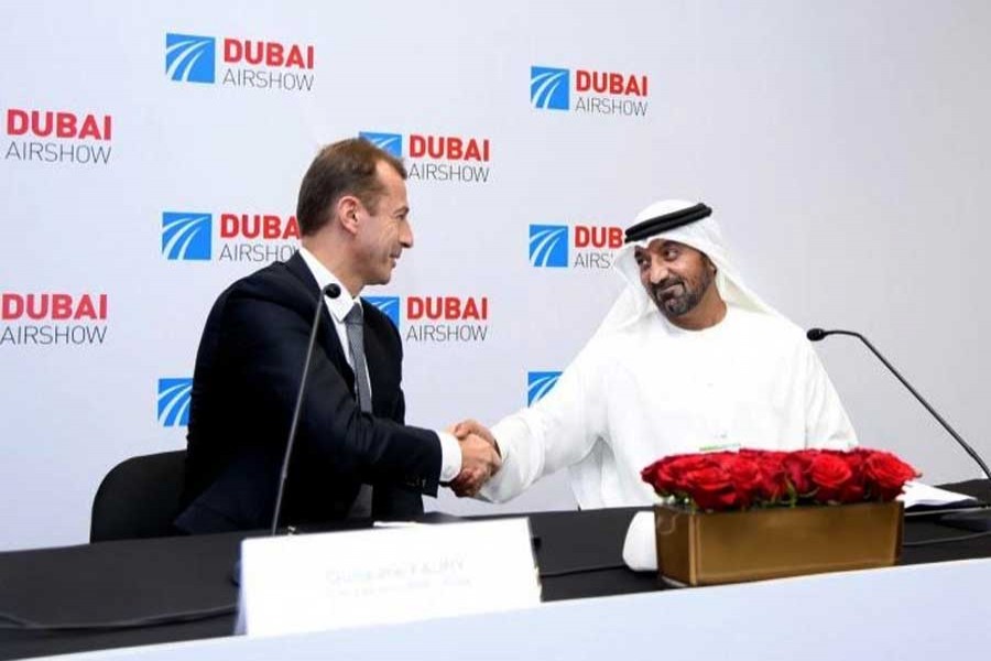 Sheikh Ahmed bin Saeed Al Maktoum, Emirates Chairman and Chief Executive and Guillaume Faury, Airbus Chief Executive Officer seen at the signing ceremony