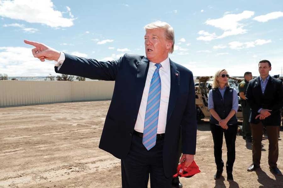 US President Donald Trump speaks as he visits the US-Mexico border wall in Calexico, California, on April 05, 2019. —Photo: Reuters