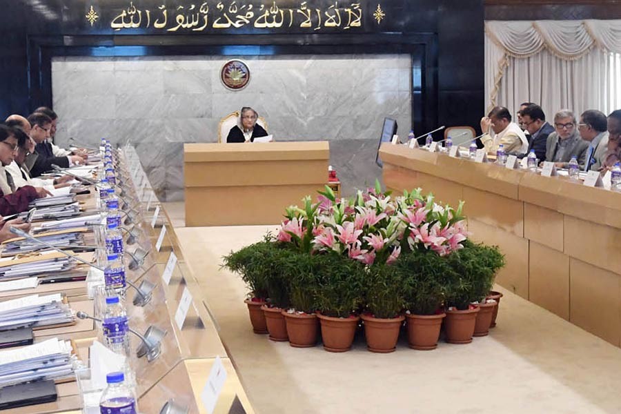 Prime Minister Sheikh Hasina presiding over the weekly cabinet meeting at the PMO on Monday. -PID Photo