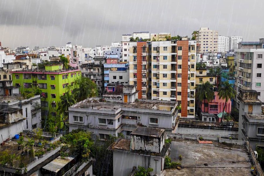 A view of a rainy Dhaka with scattered clouds hovering over the city's skyline — UNB/Files