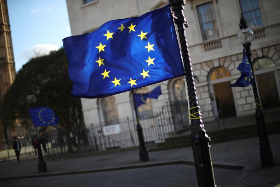 European Union flag fly from lamp posts opposite the Houses of Parliament in London, Britain, January 16, 2018. REUTERS/Hannah McKay