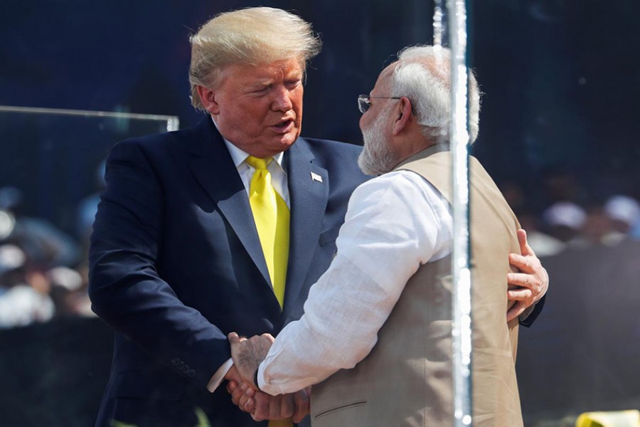 US President Donald Trump embraces with Indian Prime Minister Narendra Modi during the "Namaste Trump" event at Sardar Patel Gujarat Stadium, in Ahmedabad, India on February 24, 2020. —Photo: Reuters