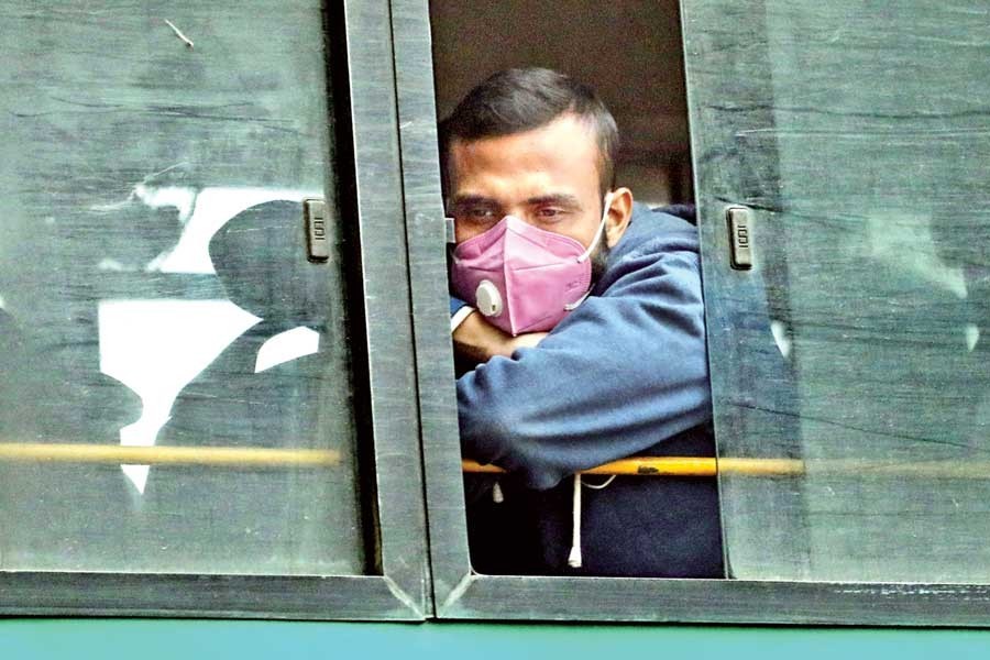 A bus passenger wearing a mask amid coronavirus fears at Paltan in Dhaka city, January 29, 2020. —FE Photo/Files