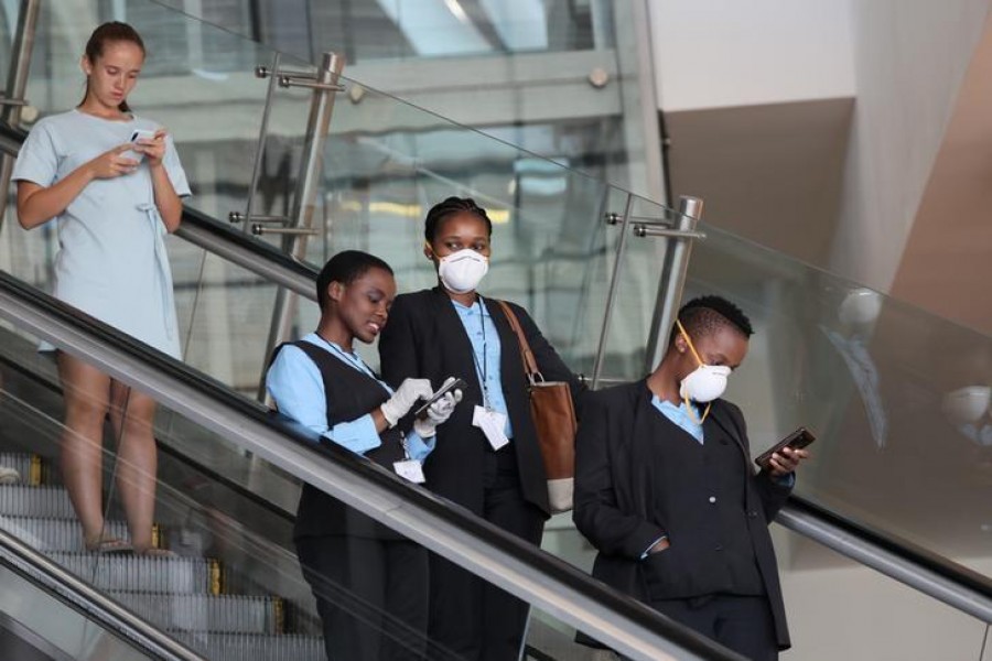 Top News March 23, 2020 / 6:16 PM / 4 days ago South Africa's confirmed coronavirus cases jump by 128 to 402 1 Min Read Airport staff wear protective masks at Cape Town International Airport, amid the coronavirus outbreak, in Cape Town, South Africa, March 18, 2020. REUTERS/Sumaya Hisham