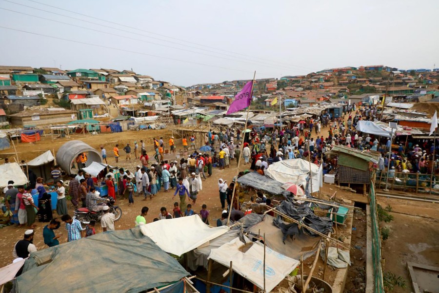 Rohingya refugees gather at a market inside a refugee camp in Cox's Bazar, Bangladesh on March 7, 2019 — Reuters/Files