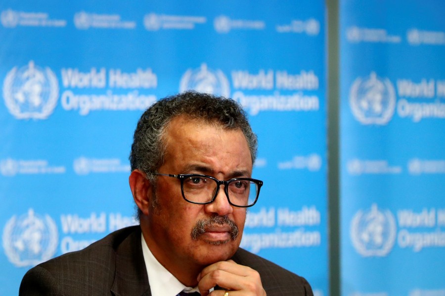 FILE PHOTO: Director General of the World Health Organization (WHO) Tedros Adhanom Ghebreyesus attends a news conference on the situation of the coronavirus (COVID-2019), in Geneva, Switzerland, February 28, 2020. REUTERS/Denis Balibouse