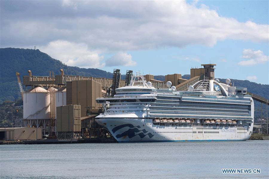 The Ruby Princess cruise ship docks at Port Kembla in Wollongong, Australia, April 6, 2020. Australian authorities launched a criminal investigation Sunday into the COVID-19 infected cruise ship, which was allowed to dock in Sydney before releasing thousands of passengers directly into the community. (Photo by Zhu Hongye/Xinhua)