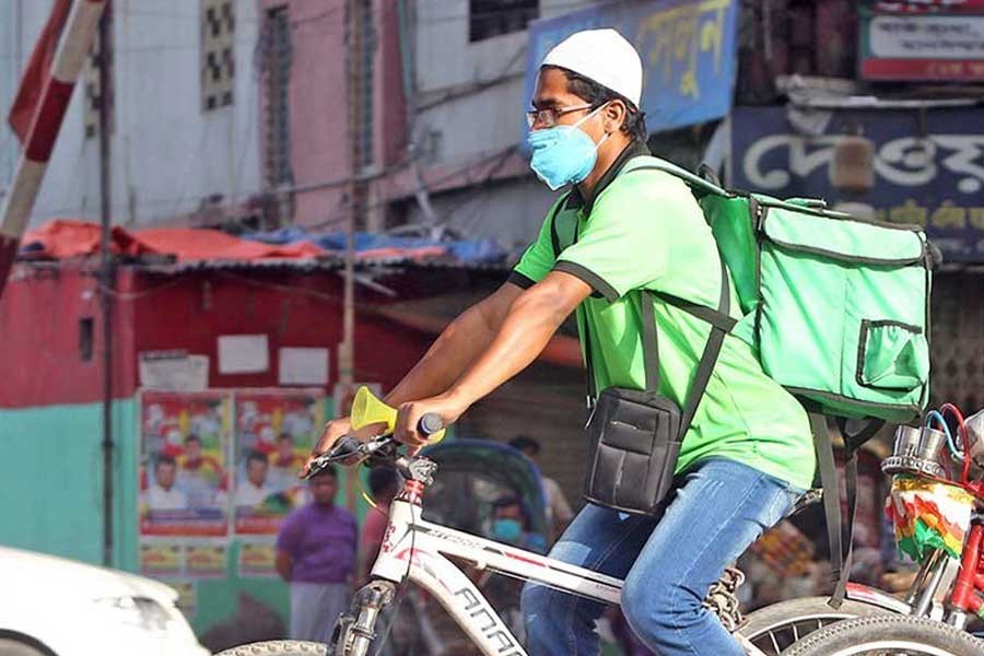 A biker delivering food in the city recently –FE file photo