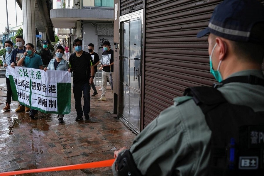 Activists march against new security laws, near China's Liaison Office, in Hong Kong, China May 22, 2020. — Reuters
