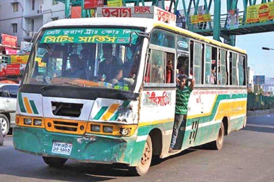 A city bus with passengers aboard is seen in the image. — Collected Photo