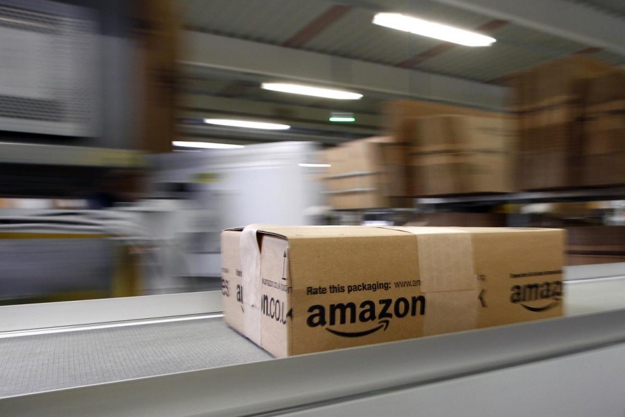 A parcel moves on the conveyor belt at Amazon's logistics centre in Graben near Augsburg on December 16, 2013 — Reuters/Files