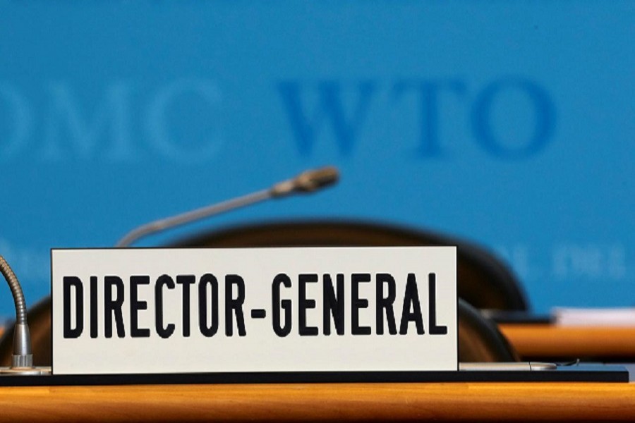 A sign is pictured in front of the chair of the Director General before the start of the General Council of the World Trade Organization (WTO) in Geneva, Switzerland, July 22, 2020. REUTERS/Denis Balibouse
