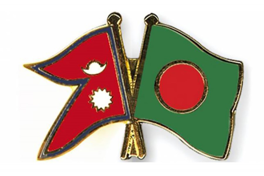 Flags of Bangladesh and Nepal are seen cross-pinned in this photo symbolising friendship between the two nations