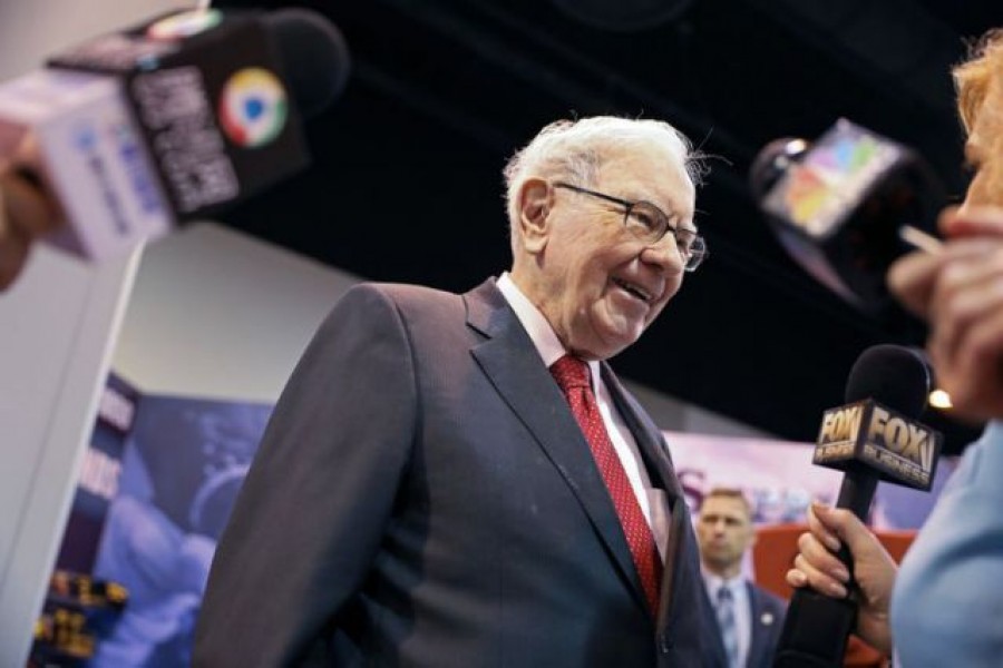 Berkshire Hathaway Chairman Warren Buffett walks through the exhibit hall as shareholders gather to hear from the billionaire investor at Berkshire Hathaway Inc's annual shareholder meeting in Omaha, Nebraska, US, May 04, 2019 — Reuters