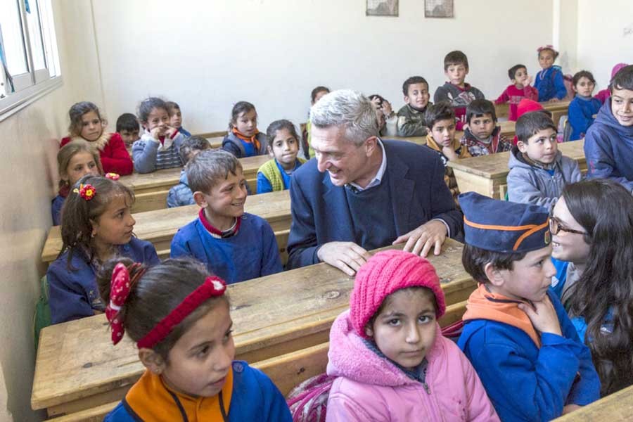 UNHCR chief Filippo Grandi chats with pupils at the Al-Shuhada School in Souran, Syria –UNHCR Photo