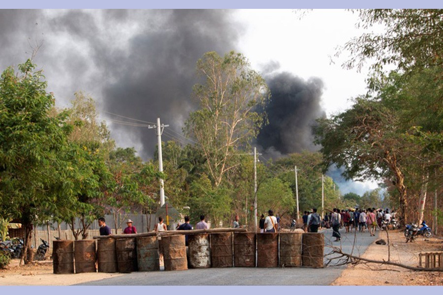 Demonstrators are seen before a clash with security forces in Taze, Sagaing Region, Myanmar April 7, 2021, in this image obtained by Reuters.