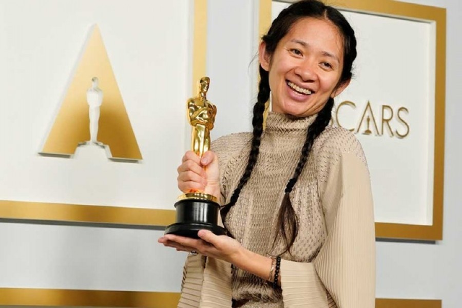 Director/Producer Chloe Zhao, winner of the award for best picture for "Nomadland," poses in the press room at the Oscars in Los Angeles, California, US, April 25, 2021. REUTERS
