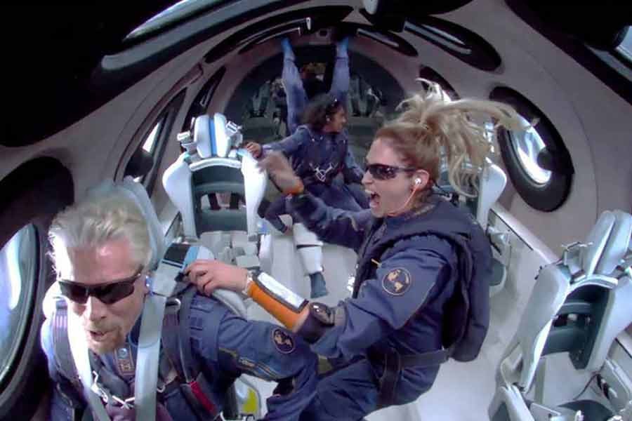 Billionaire Richard Branson makes a statement as crew members Beth Moses and Sirisha Bandla float in zero gravity on board Virgin Galactic's passenger rocket plane VSS Unity after reaching the edge of space above Spaceport America in US on July 11. —Reuters