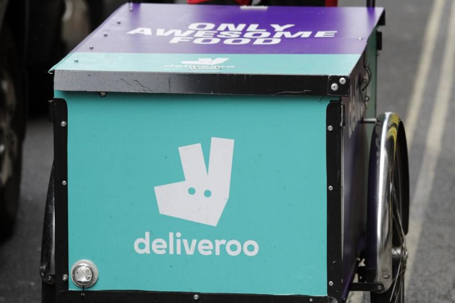 This Tuesday, July 11, 2017 file photo, shows a deliveroo logo on a bicycle in London. (AP Photo/Frank Augstein, File)