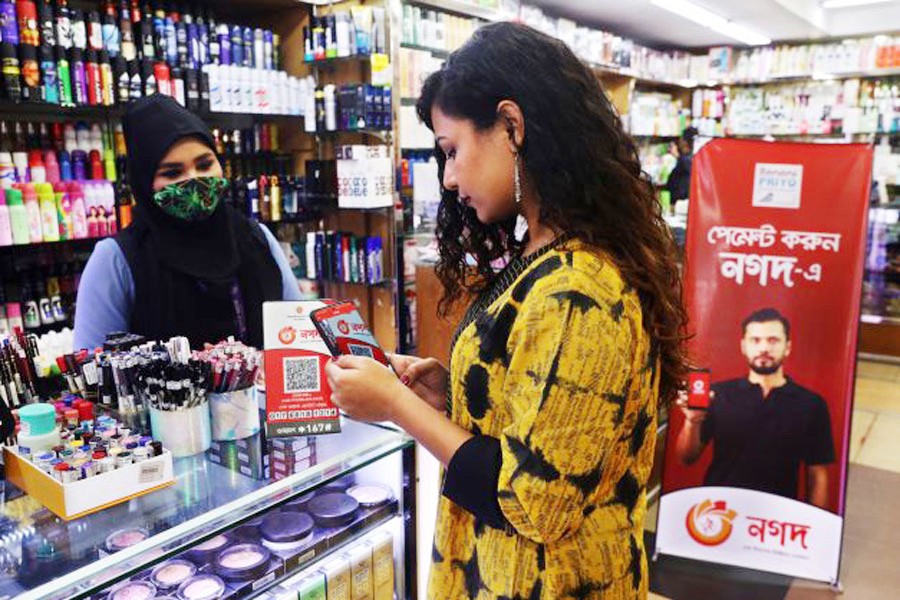 A customer is using Nagad, a mobile financial service, for making a payment. —Photo Collected