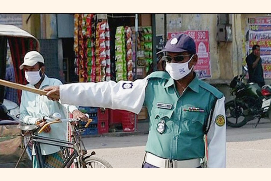 A traffic police constable on duty in Dhaka. —Collected Photo