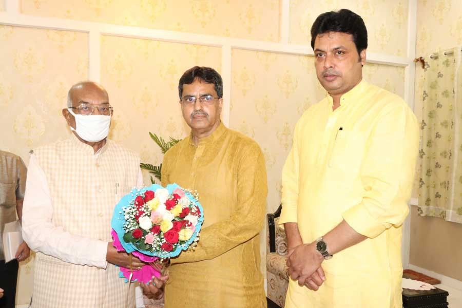 Manik Saha (centre), new chief minister of India’s Tripura state, meeting governor of the state on Saturday –Twitter photo