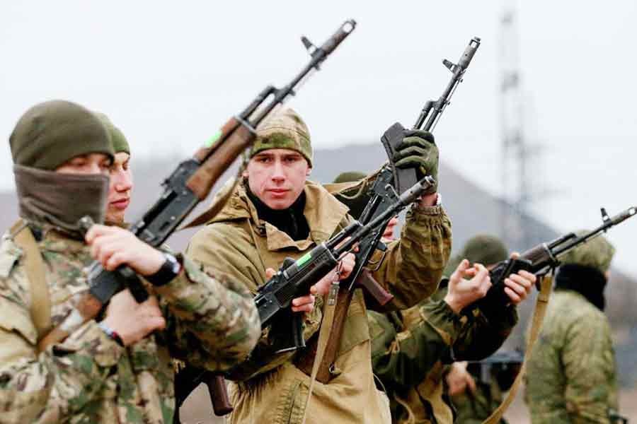 Militants of the self-proclaimed Donetsk People's Republic take part in shooting drills at a range on the outskirts of Donetsk, Ukraine, on December 14, 2021. —Reuters Photo