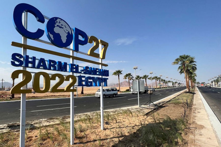 View of a COP27 sign on the road leading to the conference area in Egypt's Red Sea resort of Sharm el-Sheikh, Egypt. The 2022 United Nations Climate Change Conference, more commonly referred to as Conference of the Parties of the UNFCCC, or COP27, started on Sunday. —Reuters Photo