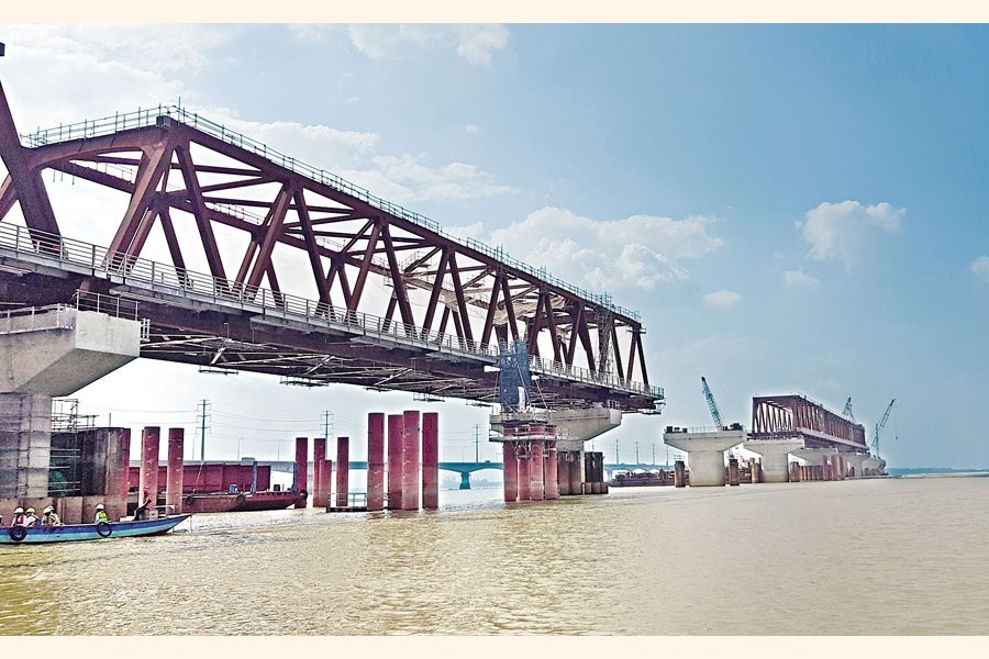 The construction work of the Bangabandhu Sheikh Mujib Railway Bridge over the Jamuna River in Tangail is going on — FE photo